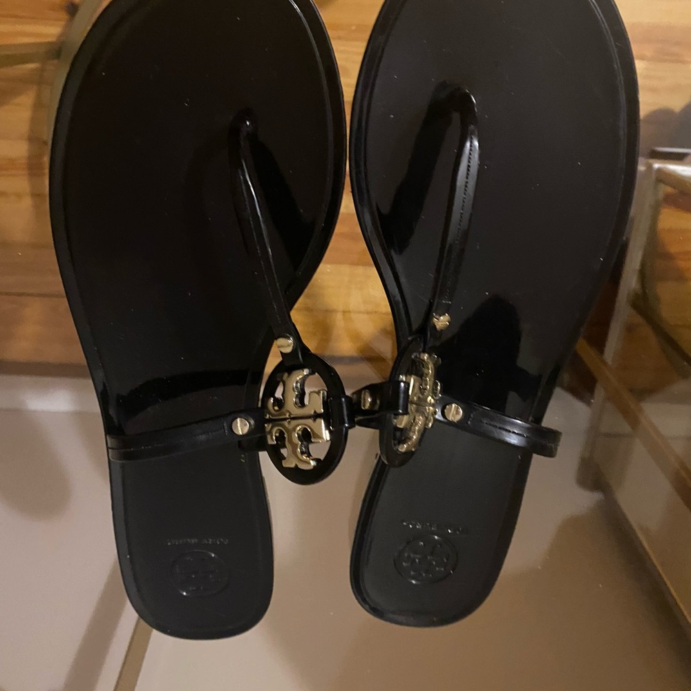 Tory Burch Black and Gold Sandals with Medallion